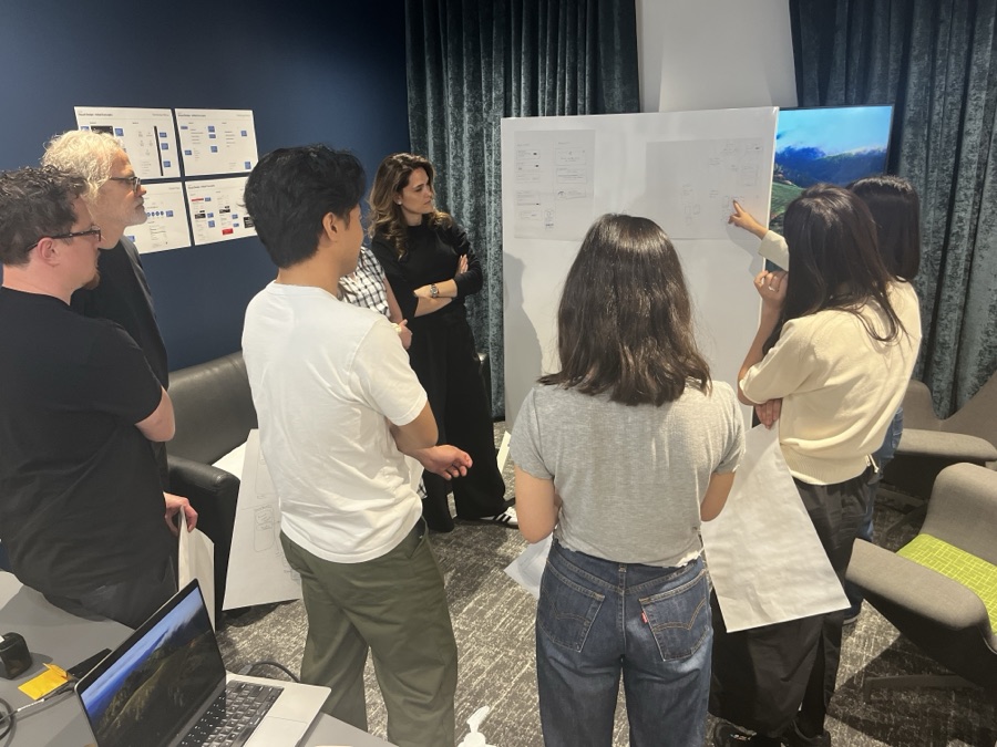 Team collaborating at a whiteboard